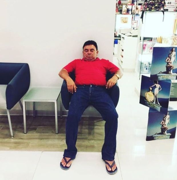 20 Funny Pics Of Miserable Men Caught Shopping With Their Wives