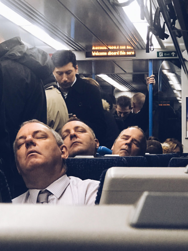 businessman asleep on a train daily - Moicoli Bola Cur 26 Welcome aboard this servi