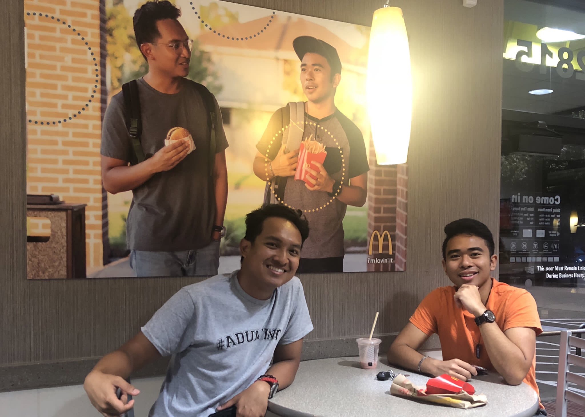 Guy Hangs A Poster Of Himself And His Buddy At A McDonald's To See If Anyone Will Notice