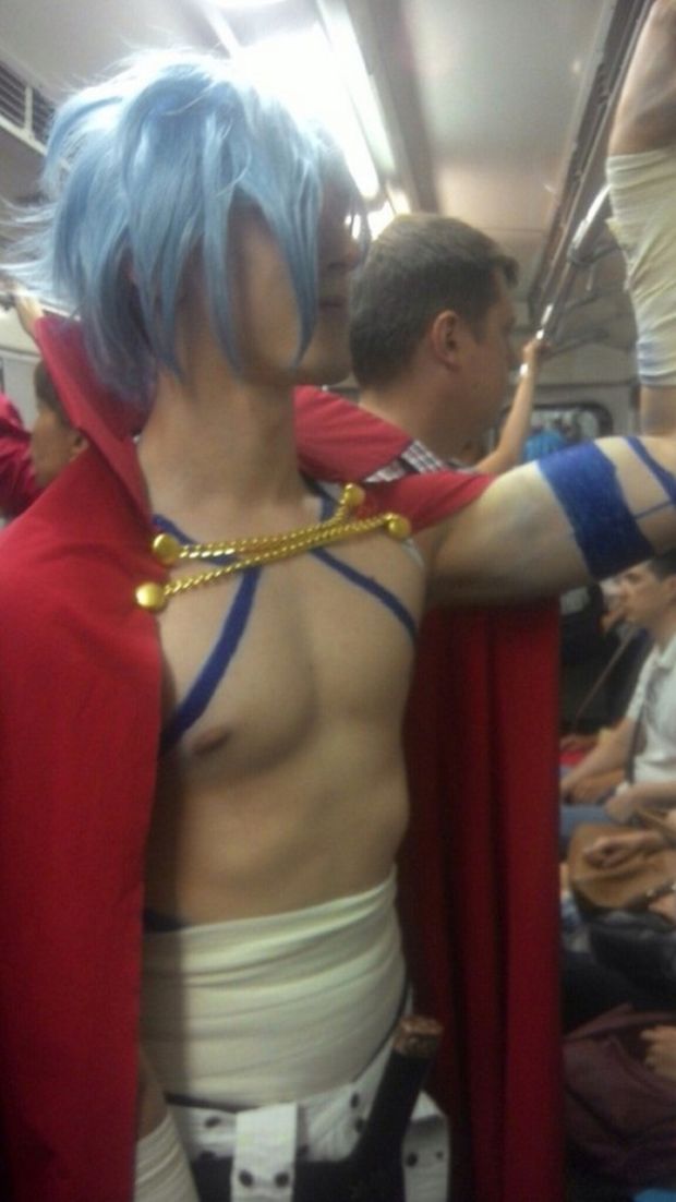 Man in cosplay on train