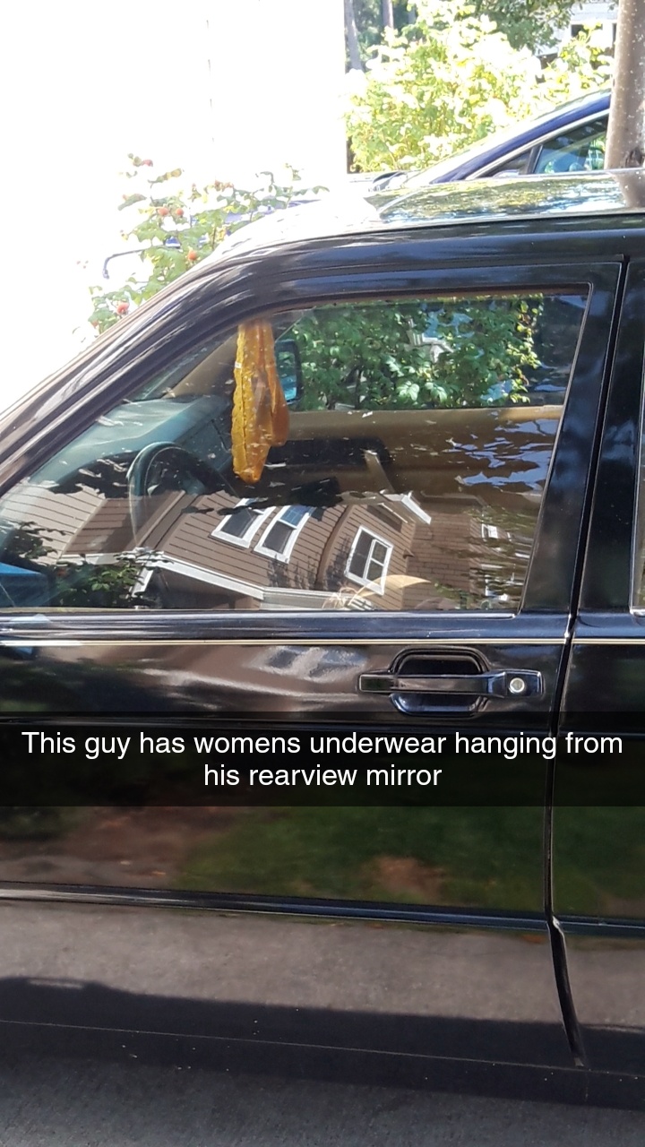 glass - This guy has womens underwear hanging from his rearview mirror