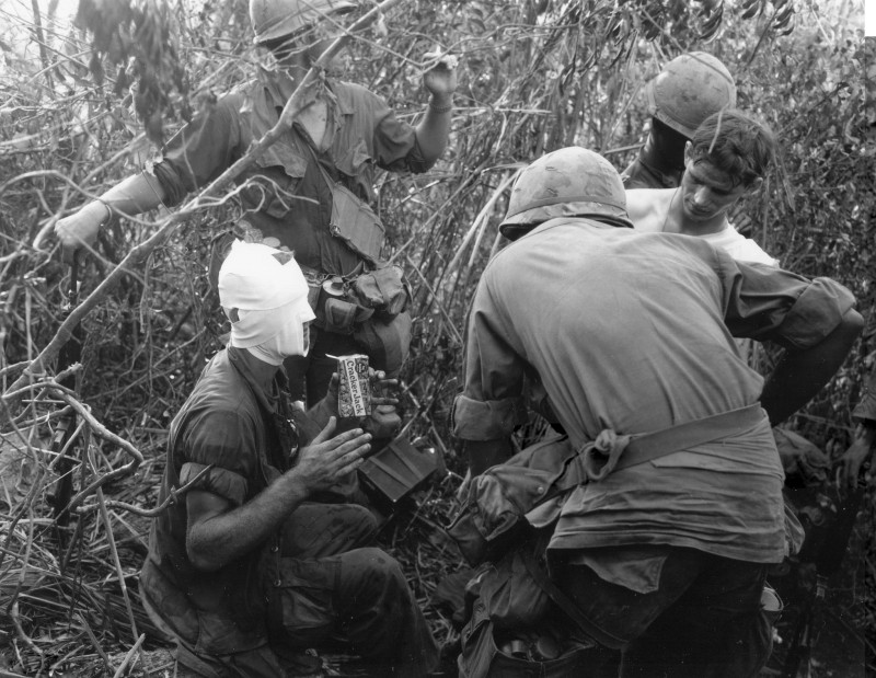 August 12 1969. Vietnam. Members of Company D ist Battalion, 501st Airborne Infantry relate battle and wounds received during action east of Tam Ky, to other members of the Company.