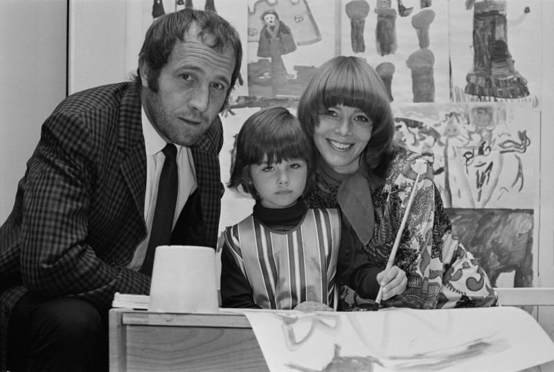 August 13 1969. English actor Ian Hendry (1931 - 1984) and English actress Janet Munro (1934 - 1972) with their daughter Sally at an art competition held at Harrods, London, UK,