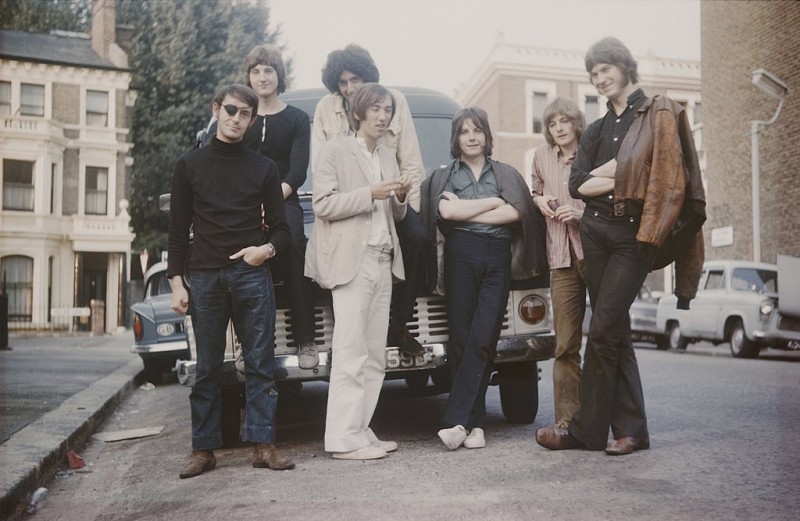 Members of the group Smile posed in Addison Gardens, West Kensington, London in August 1969. Left to right: Bruce Sanderson (with eye patch), Paul Humbertone, Brian May (sitting on bonnet), Pete Edmunds, Tim Staffell, Clive Armitage and Paul Fielder.