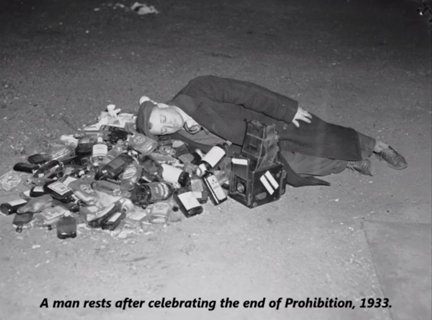 man celebrating end of prohibition - A man rests after celebrating the end of Prohibition, 1933.