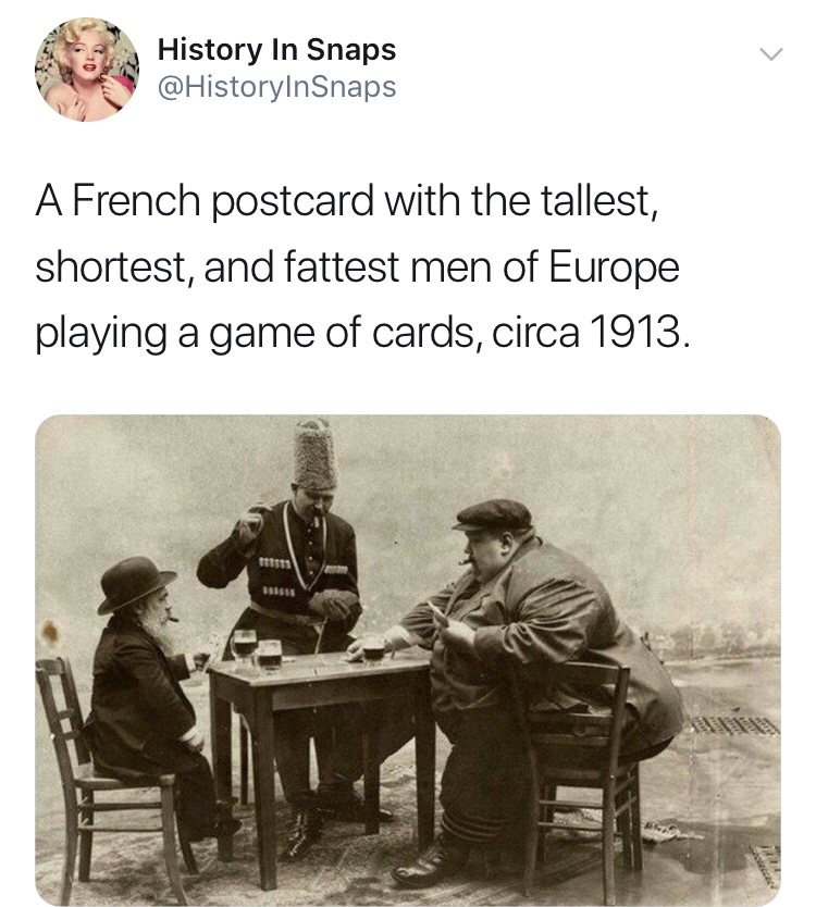 history photo - tallest and fattest man - History In Snaps A French postcard with the tallest, shortest, and fattest men of Europe playing a game of cards, circa 1913.
