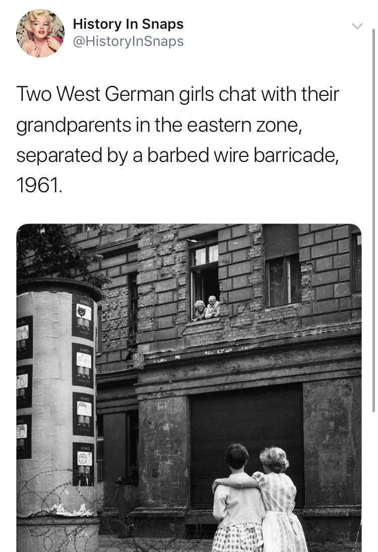 history photo - berlin wall 60s - History In Snaps Two West German girls chat with their grandparents in the eastern zone, separated by a barbed wire barricade, 1961.