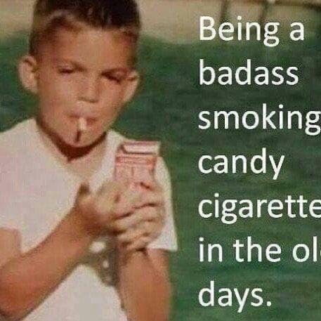 smoking candy cigarettes - Being a badass smoking candy cigarette in the ol days.