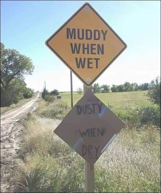 street sign - Muddy When Wet Dusty When