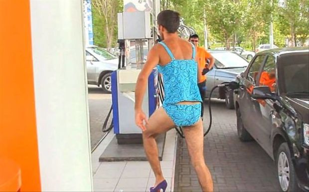 guy in heels gas station
