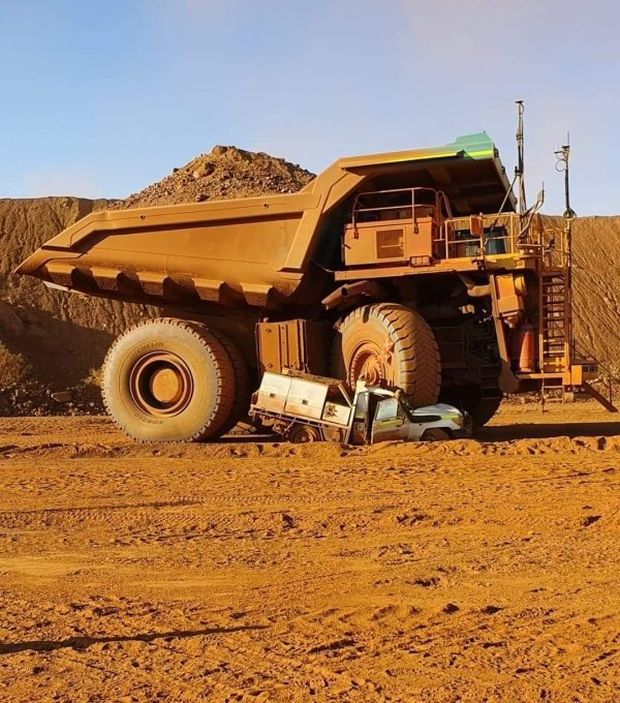 mining truck crushes ute