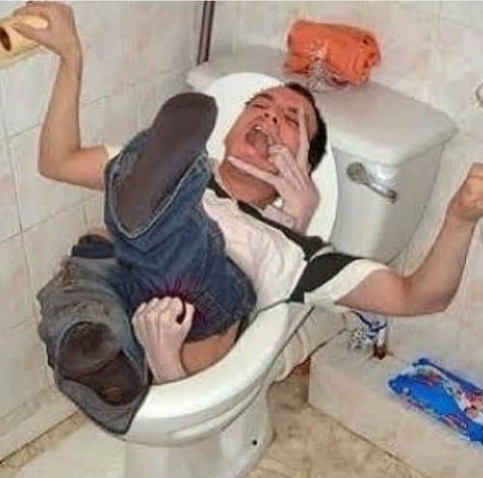 extreme cursed man inside a toilet