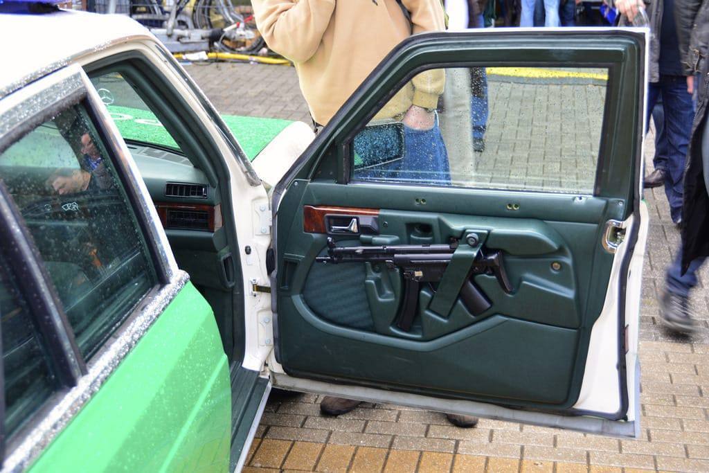 gun in car door