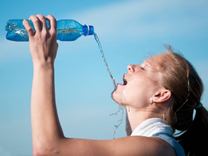 person struggling to drink water