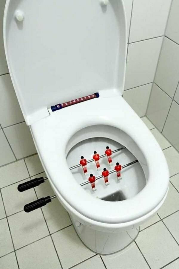 funny pics and memes - foosball game installed inside toilet