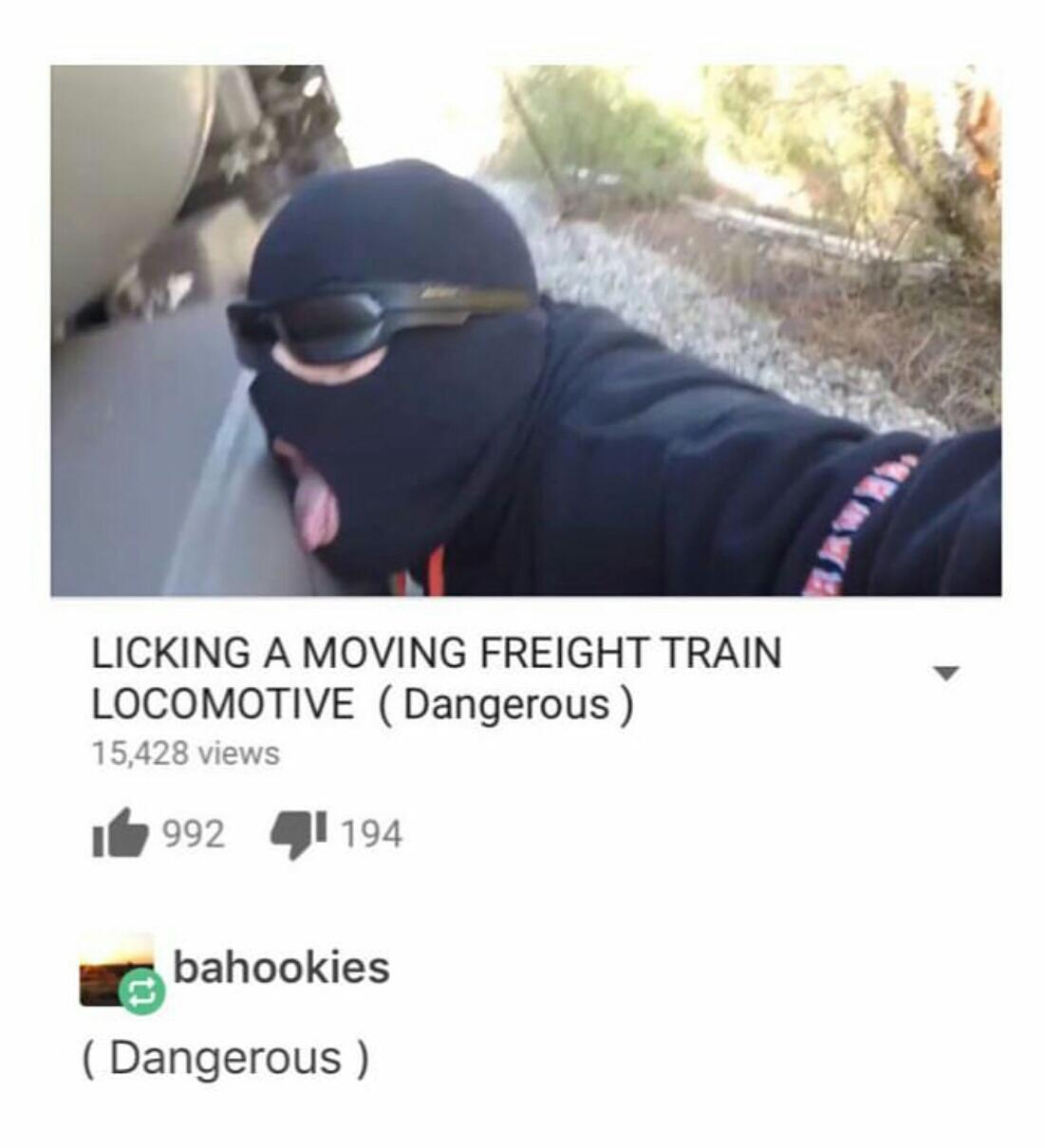funny pics - Licking A Moving Freight Train Locomotive Dangerous