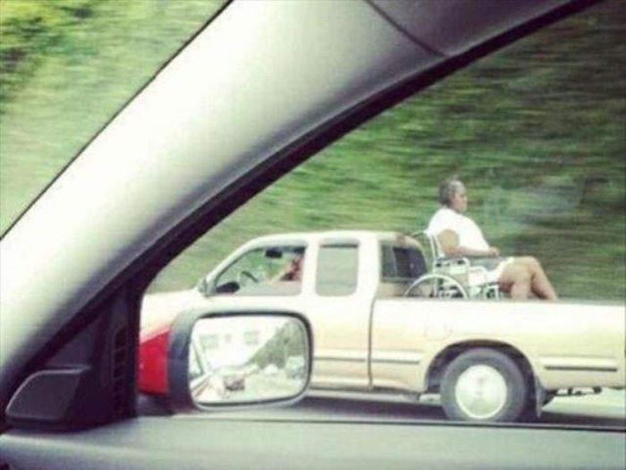 woman in wheelchair in back of truck