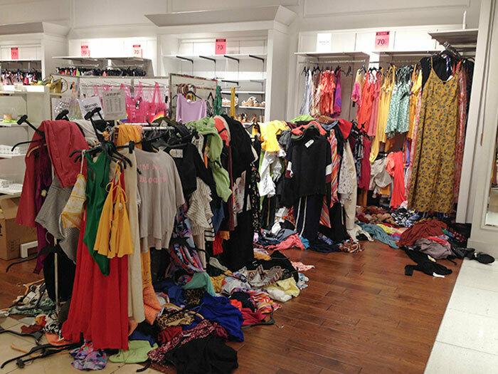 clothes on floor at store - 70