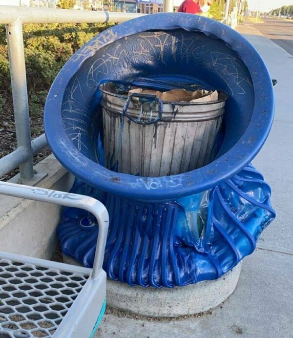 You know it's hot when the trashcans are melting.