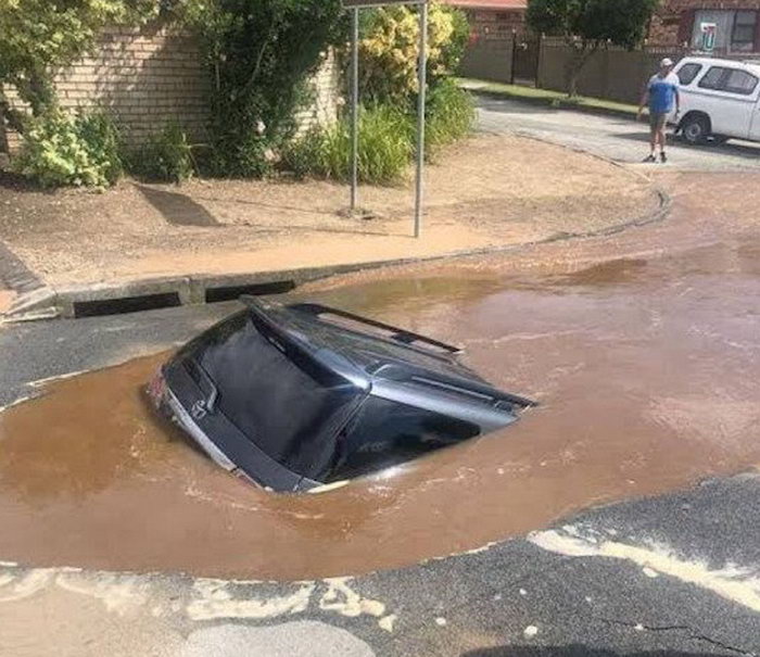 unluckiest people ever - george car in pothole