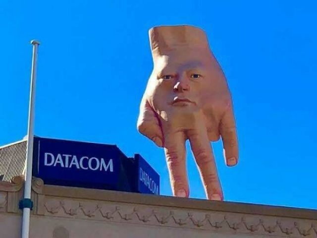 WTF Pictures - hand on building