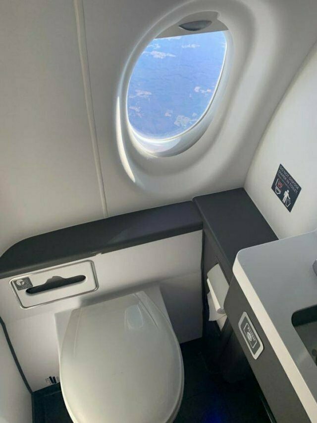 wtf things in the wild - plane toilet with window - Wowong
