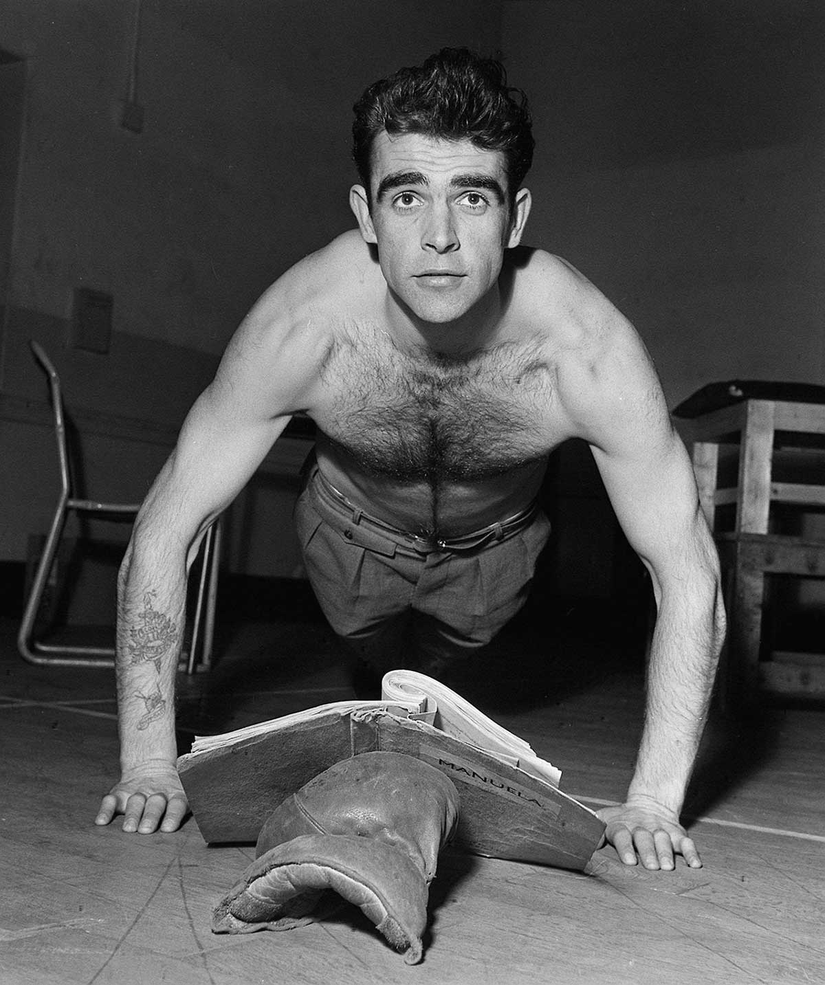 A young Sean Connery showing off for the camera in the mid 1950s.