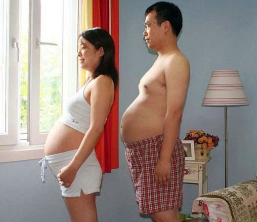 funny pic couple look pregnant