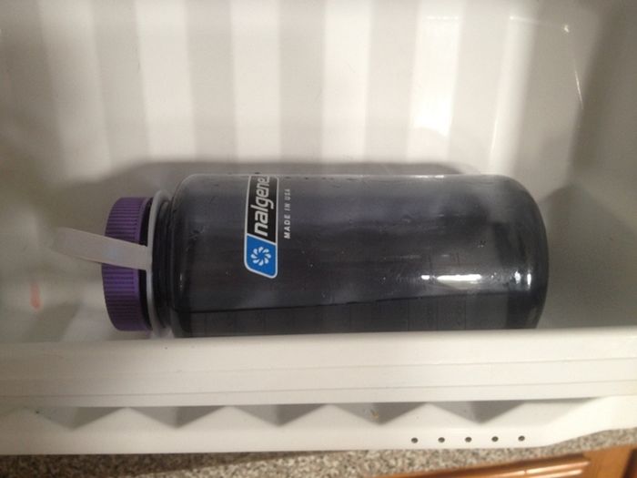 Freeze a water bottle on its side to ensure you have cold water the next morning when you fill the rest of it up
