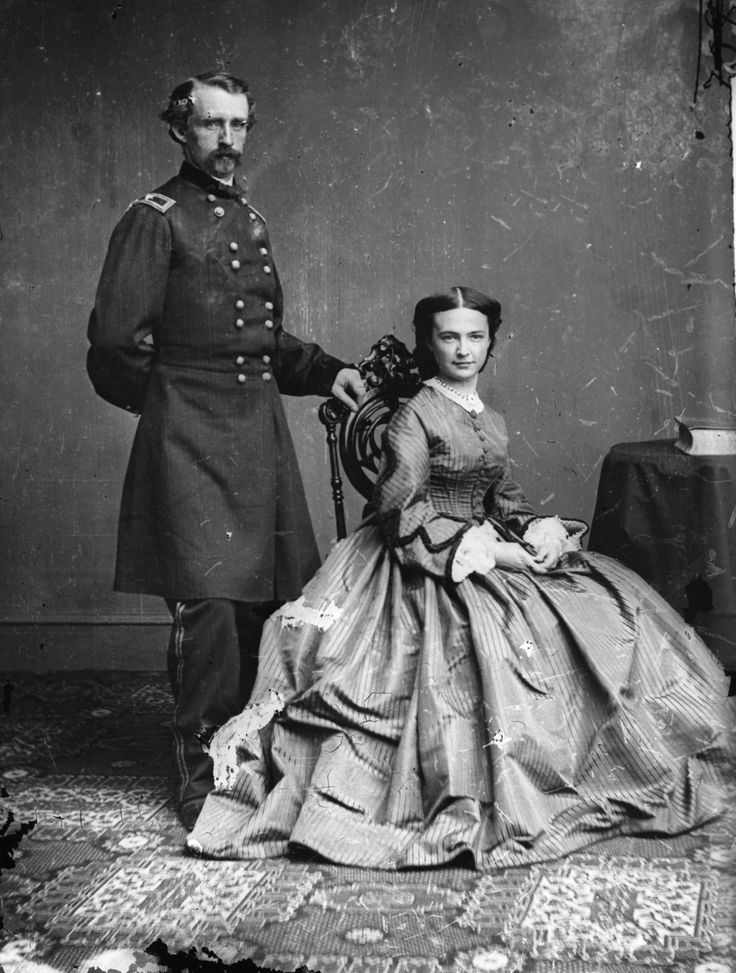 The classic man standing, woman sitting photo standard
