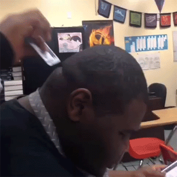 gifs - person swipes a card in a mans head wrinkles