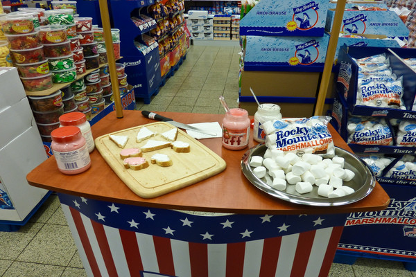 Free samples - These often create an obligation in taste testers to buy something since it was free. Or at the very least, you'll check out the displayed items near the food you would have otherwise missed.
