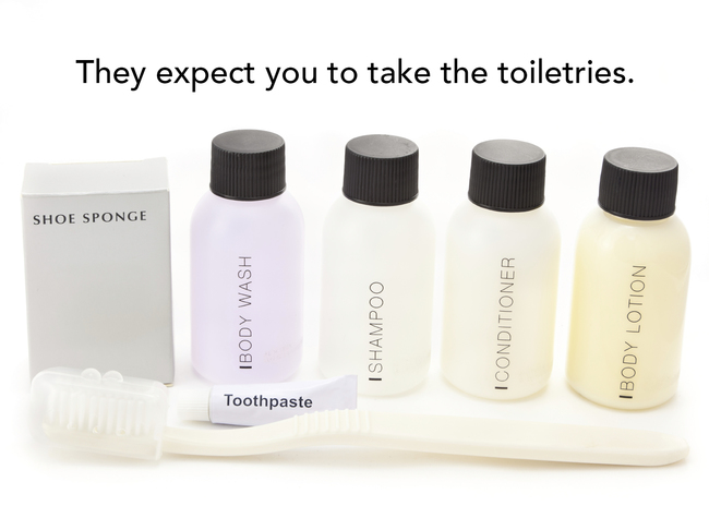 It's not stealing: those toiletries were put there for your use. If it looks like they've been opened, they'll all be tossed anyway.