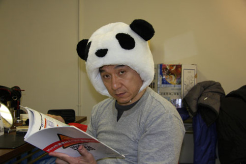 jackie chan wearing a panda hat