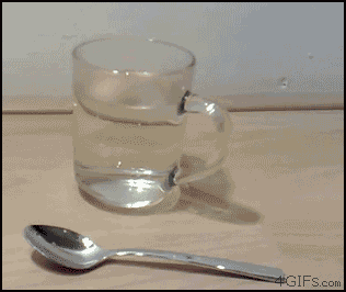 A spoon made out of gallium and a cup of water