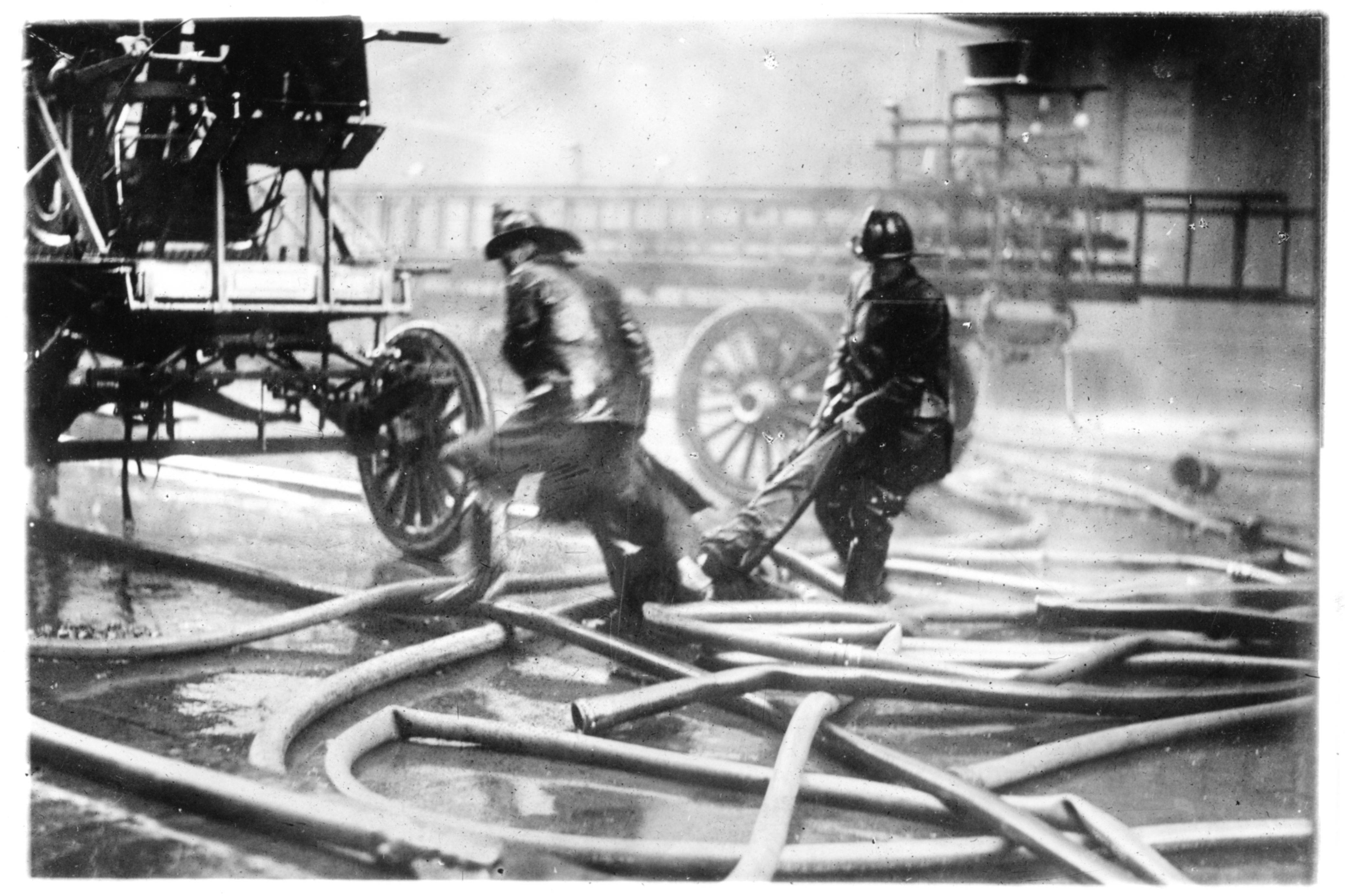 Fire Fighters Carrying a Victim of the Triangle Shirtwaist Factory Fire, March 25th, 1911.