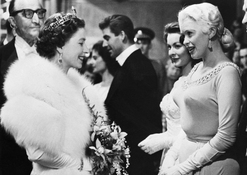 Queen Elizabeth meets Jayne Mansfield, Odeon Theatre, London, 1957.