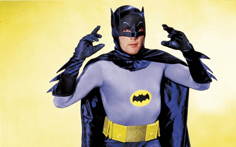 Adam West dressed as Batman