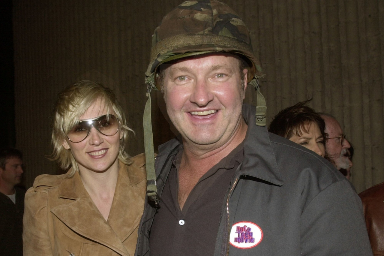 Randy Quaid looking crazy as usual wearing his battle helmet