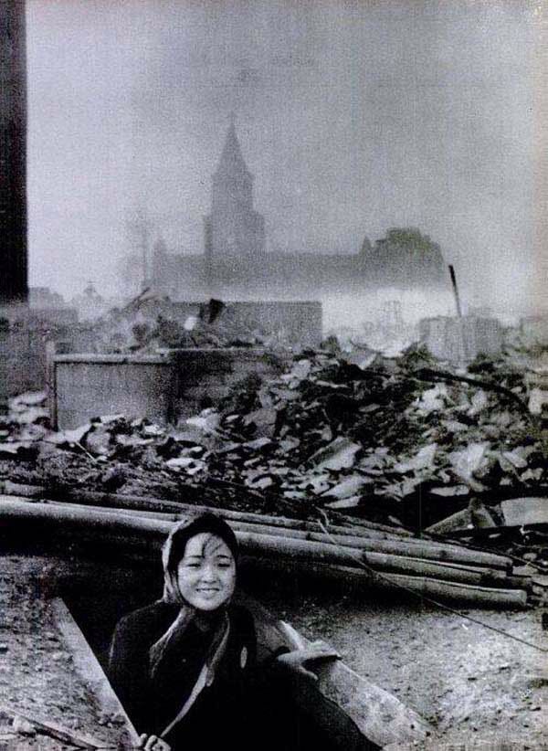 A woman who survived the Nagasaki bombing, 1945.