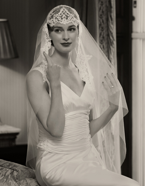 Woman wearing a wedding dress, circa 1940.