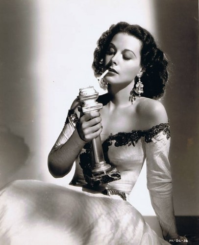 Hedy Lamarr with a rather large cigarette lighter, 1945.