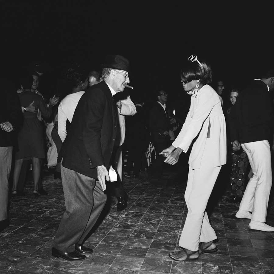 Groucho Marx dancing with Diana Ross at a party in Bel-Air (1966).