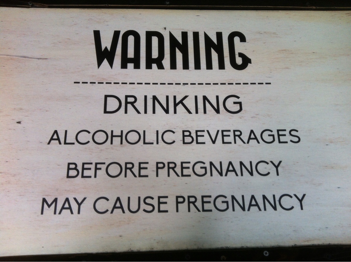 sign - Warning Drinking Alcoholic Beverages Before Pregnancy May Cause Pregnancy