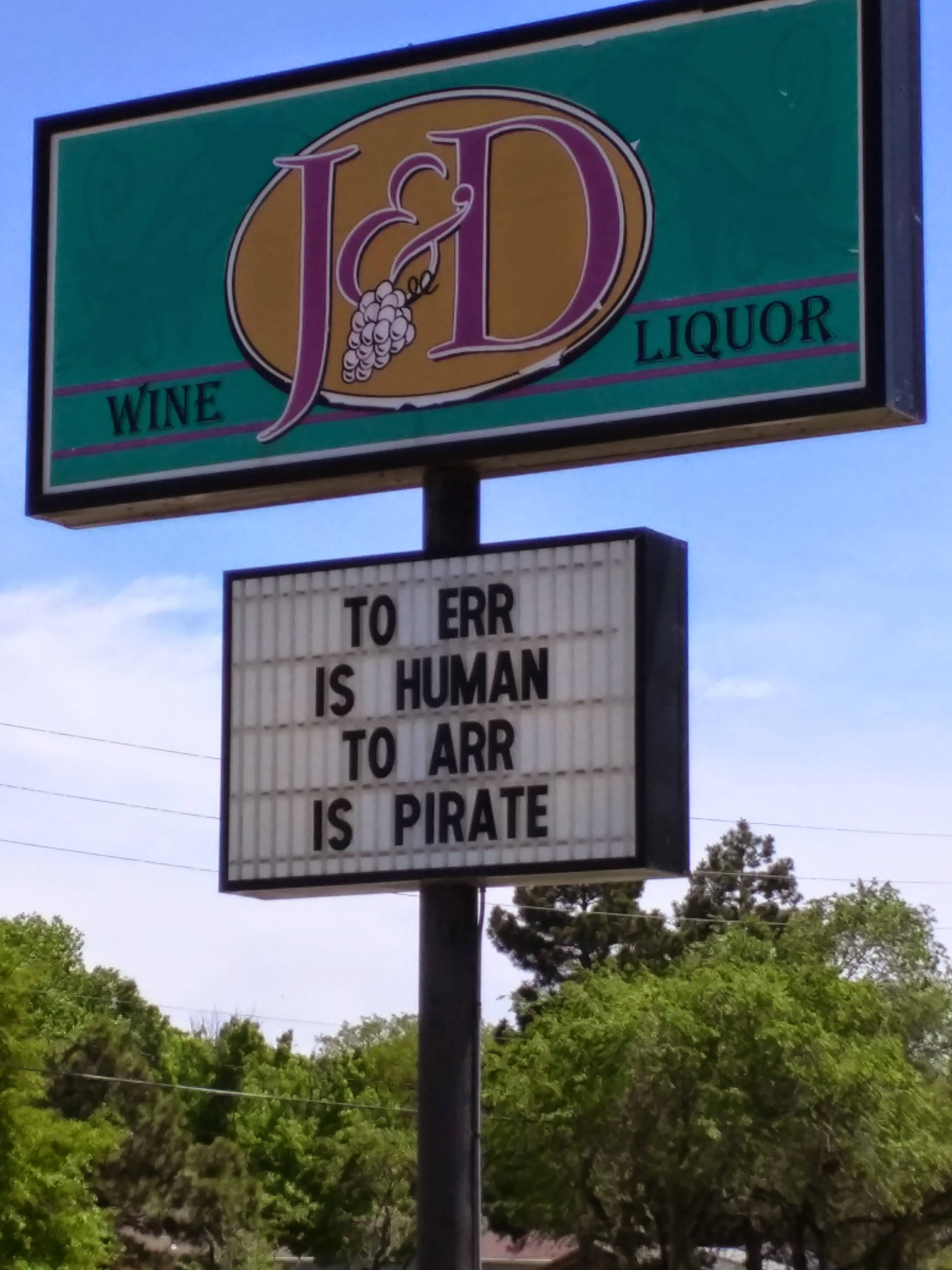 street sign - Liquor Wine To Err Is Human To Arr Is Pirate