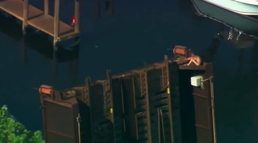 This weekend, a naked man found himself stuck on top of a 100-foot tall drawbridge in Fort Lauderdale. The police and city officials rushed to the scene with ladders and a pair of shorts.