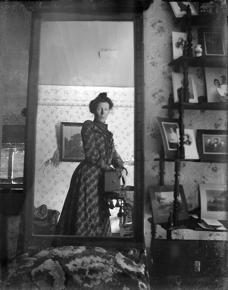 Possibly the first mirror selfie, ~1900.