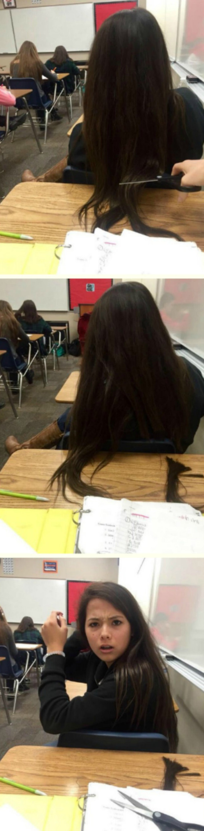 guy cuts girls hair on desk