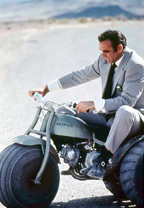 Sean Connery looking badass on a weird Honda tricycle (1960s).