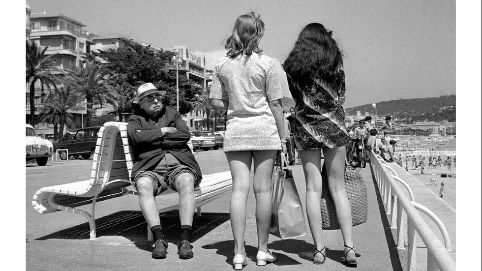 Oldschool guy checking out the miniskirts in 1969.